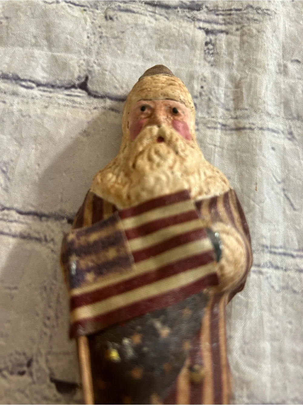 VINTAGE FOLK-ART STYLE PATRIOTIC SANTA OR BELSNICKEL FIGURINE WEARING A FLAG